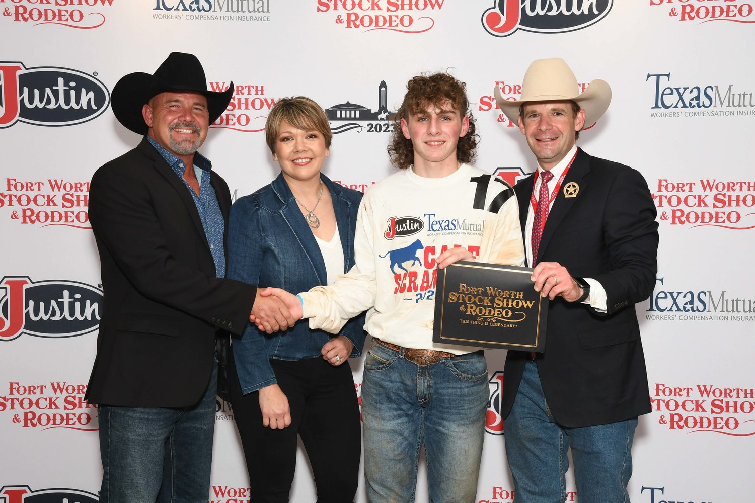 Daniel Kernes of Quitman FFA won a $500 purchase certificate in the Fort Worth Stock Show & Rodeo calf scramble Jan. 28 toward a beef or dairy heifer for a 4-H or FFA project for exhibition at next year’s show. The certificate, presented by Stock Show Calf Scramble Committee member Paxton Motheral, was sponsored by Angry Antler Ranch, represented by Ross and Mary Dionisi. Kernes’s parents are Tania and Lynn Kernes of Quitman.